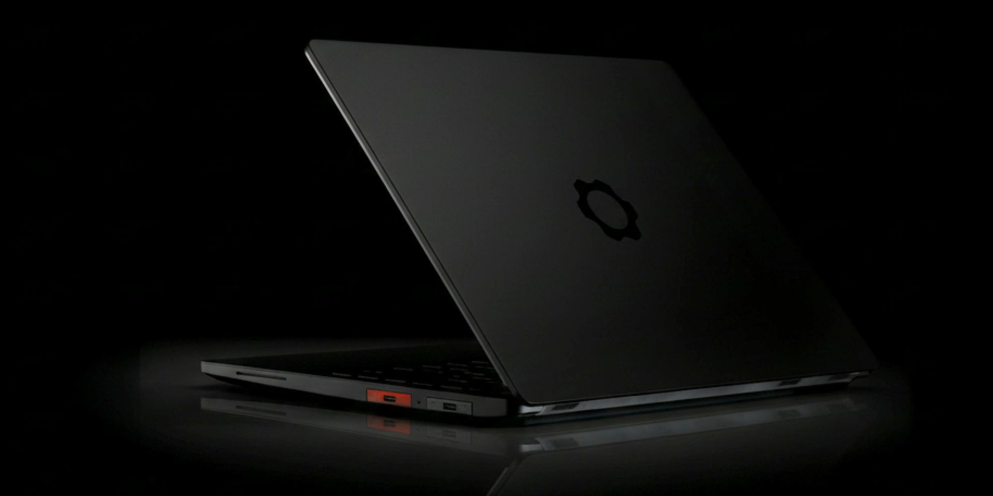 Framework Laptop 13 Pro seen in a low-key photo
